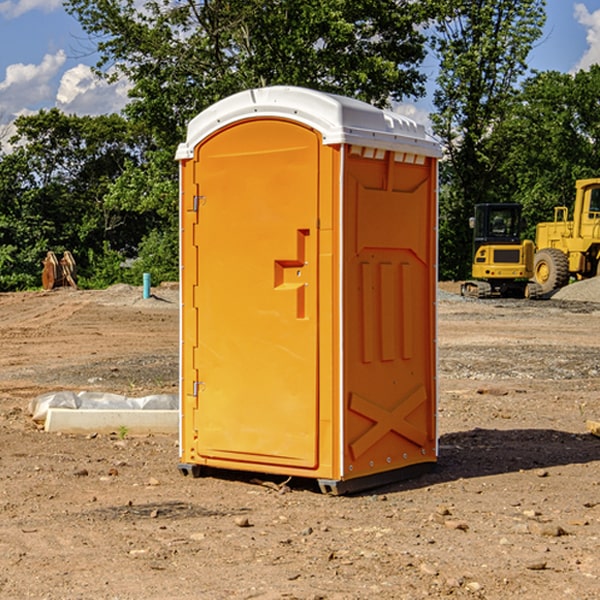 what is the cost difference between standard and deluxe portable toilet rentals in Montague